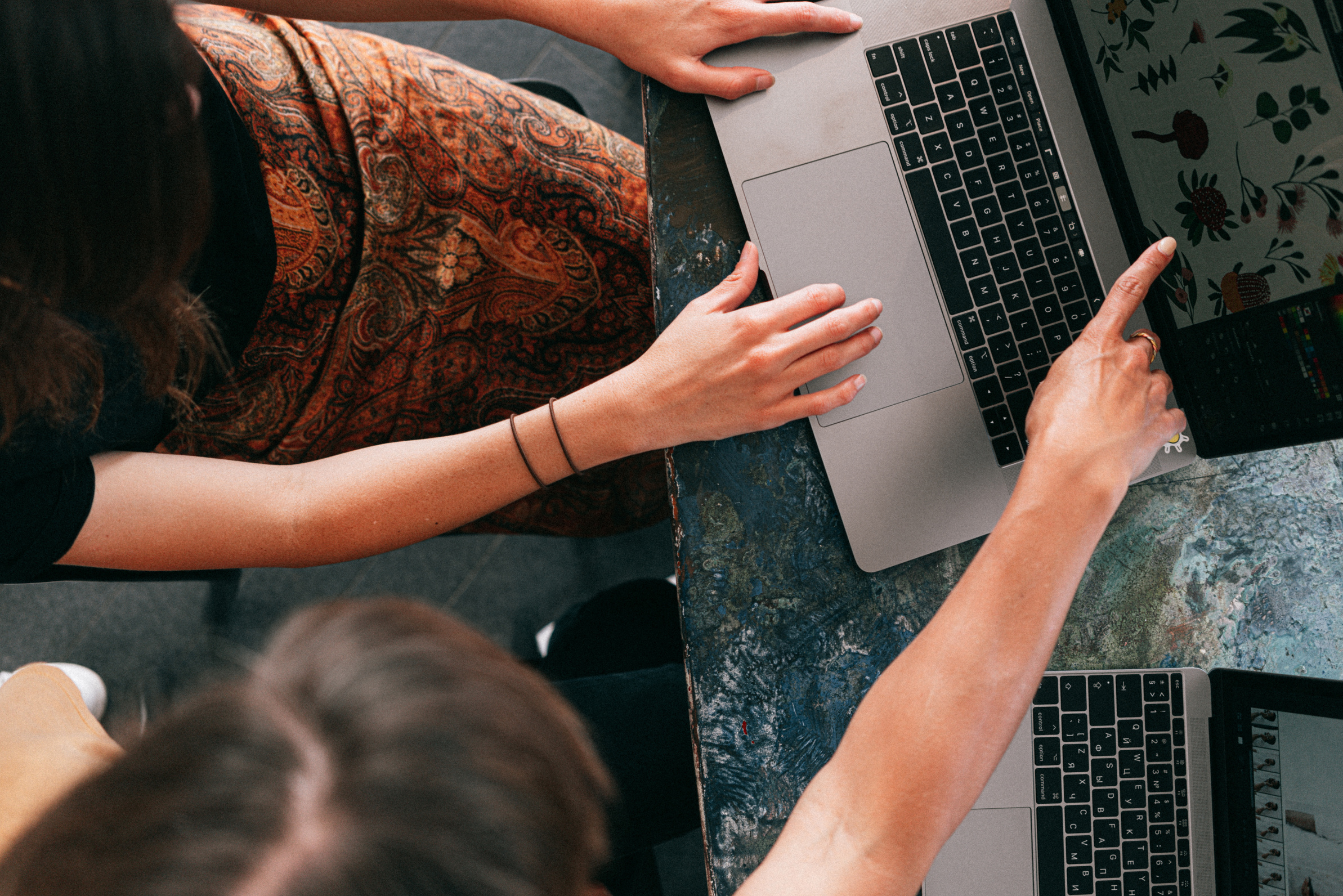 Women collaborating on laptop